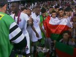 لاعبو قطر يحتفلون بلقب كأس أسيا بعلم دولة عمان