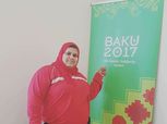 فيديو| بطلة العالم في رفع الأثقال تخطف الأضواء في التدريبات