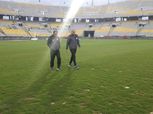بالصور| عبدالحفيظ وطارق سليمان يعاينان ملعب برج العرب قبل القمة