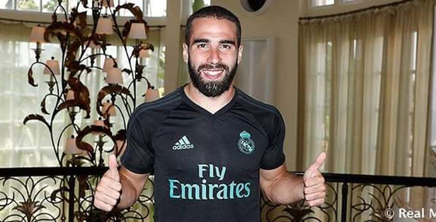 بالصور| رابطة مشجعي ريال مدريد في العراق تؤازر كارفخال أثناء لقاء المنتخب