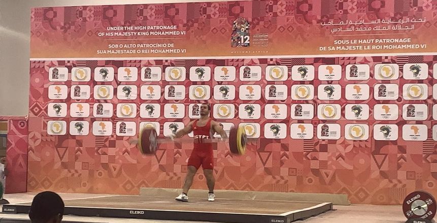 بالصور.."أبو كحلة" يضيف ذهبيتي الكلين والمجموع لوزن ٨٩ كجم.. ويحطم كل أرقام أفريقيا