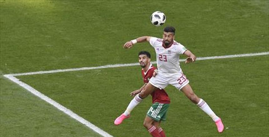 بالصور| رئيس إيران يحتفل بالفوز على المغرب بقميص المنتخب