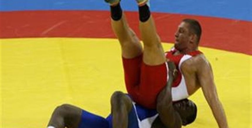 أدهم صالح لاعب المصارعة يتأهل للدور الثاني بالأولمبياد