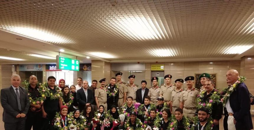 بالفيديو والصور| وصول أبطال أوليمبياد الشباب إلى مطار القاهرة